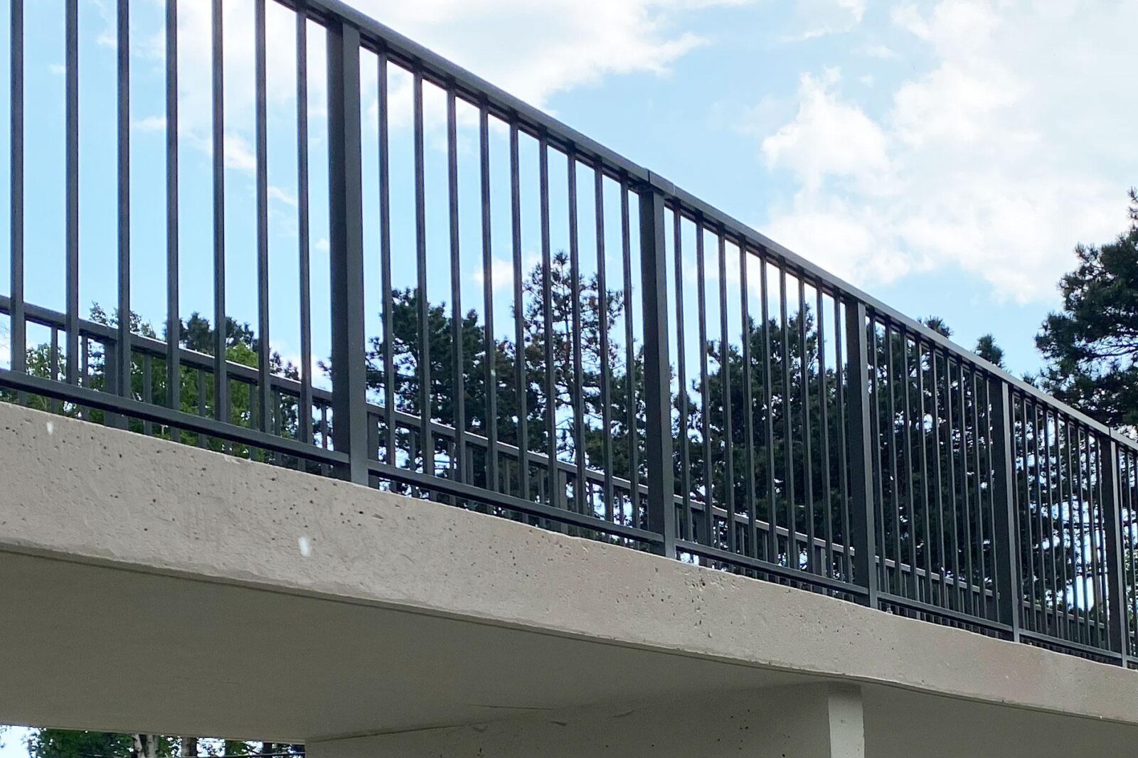 picket railing on a bridge