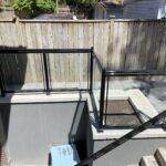glass railing for a basement walkout in toronto