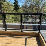 aluminum glass railing on a new deck