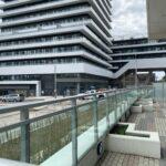 glass and panel railing on a new building in toronto