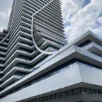 panel railing with glass on new condo in toronto