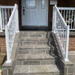 aluminum stair railing in white on a front porch in toronto