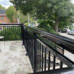 black aluminum railing on a front porch in toronto