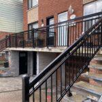 black aluminum railing on semi-detached house