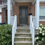 Aluminum porch railing and columns in white on a front porch in toronto