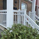 white aluminum railing and columns on a front porch in Toronto