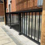 black aluminum railing on a front porch in toronto