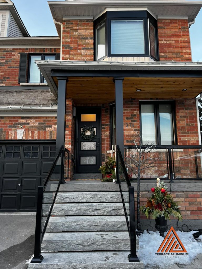 front porch columns and glass railing