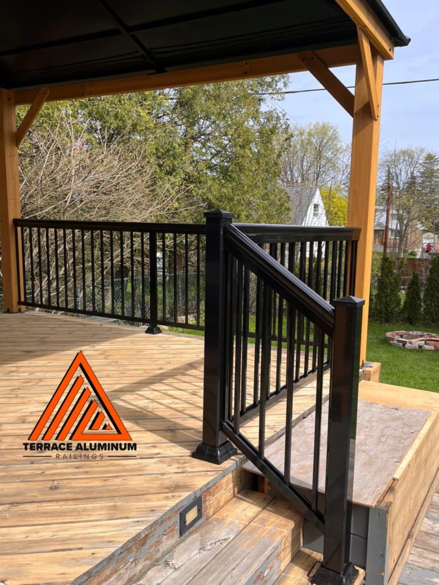 exterior aluminum railings in black colour on a wooden deck