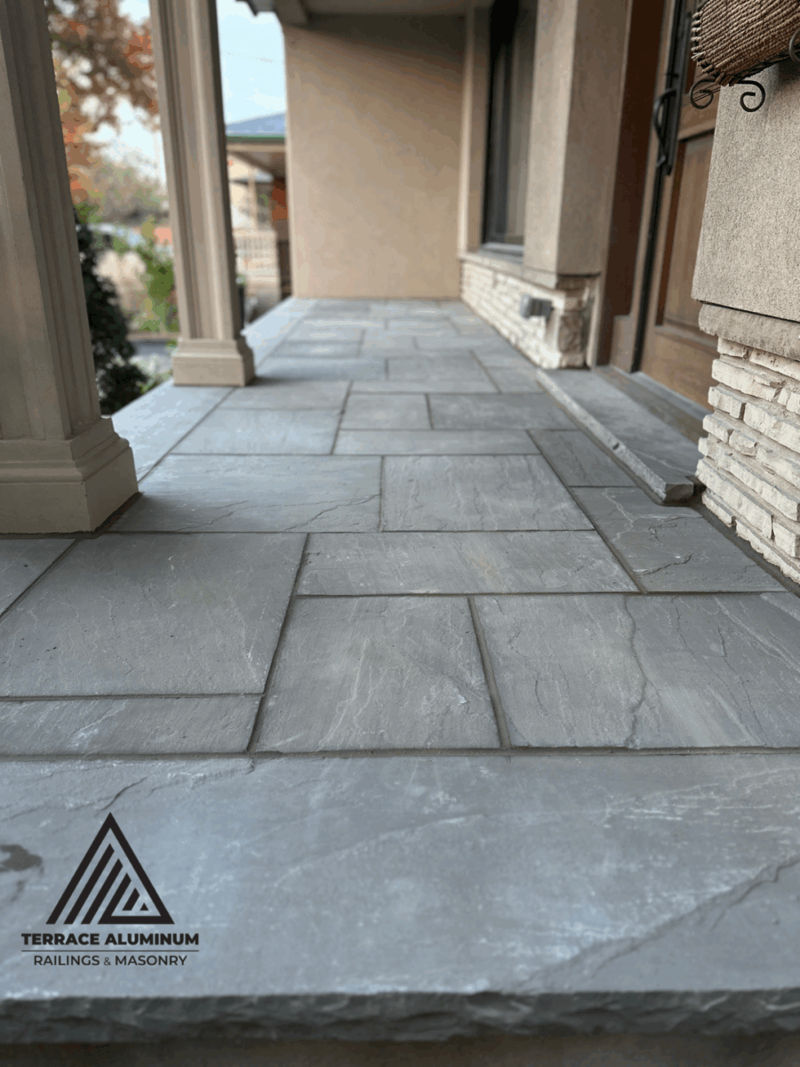 Front entrance with flagstone porch and stairs in Oakville.