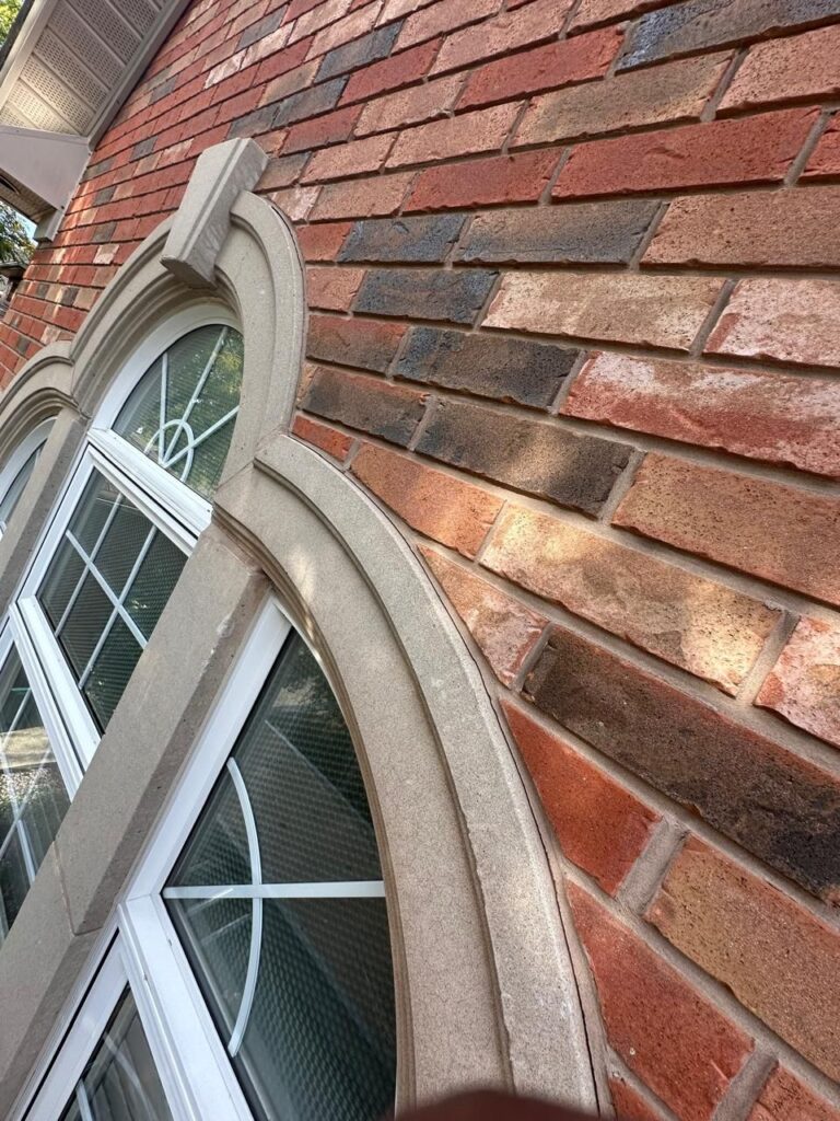 alt="Brick repair in Hamilton by Terrace Aluminum Railings & Masonry showing restored brick wall with fresh mortar joints"