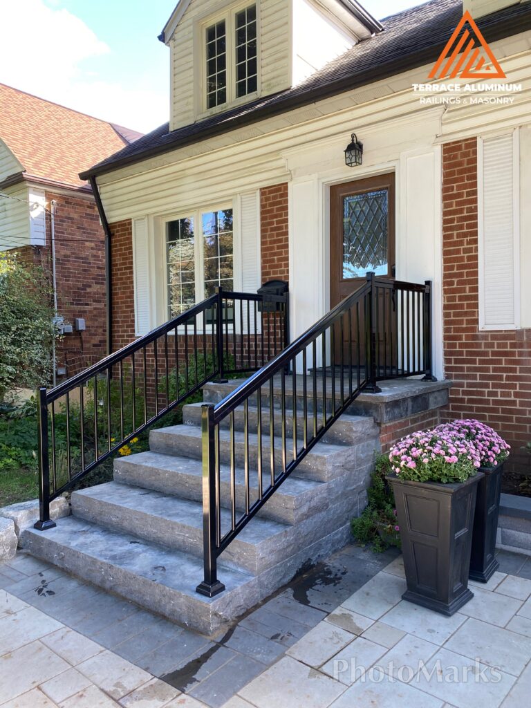 Front porch repair in Toronto by Terrace Aluminum Railings & Masonry — complete with fresh parging, aluminum railings, and 4x4 support columns. This upgrade improves structure, durability, and curb appeal while protecting the concrete base from weather damage.