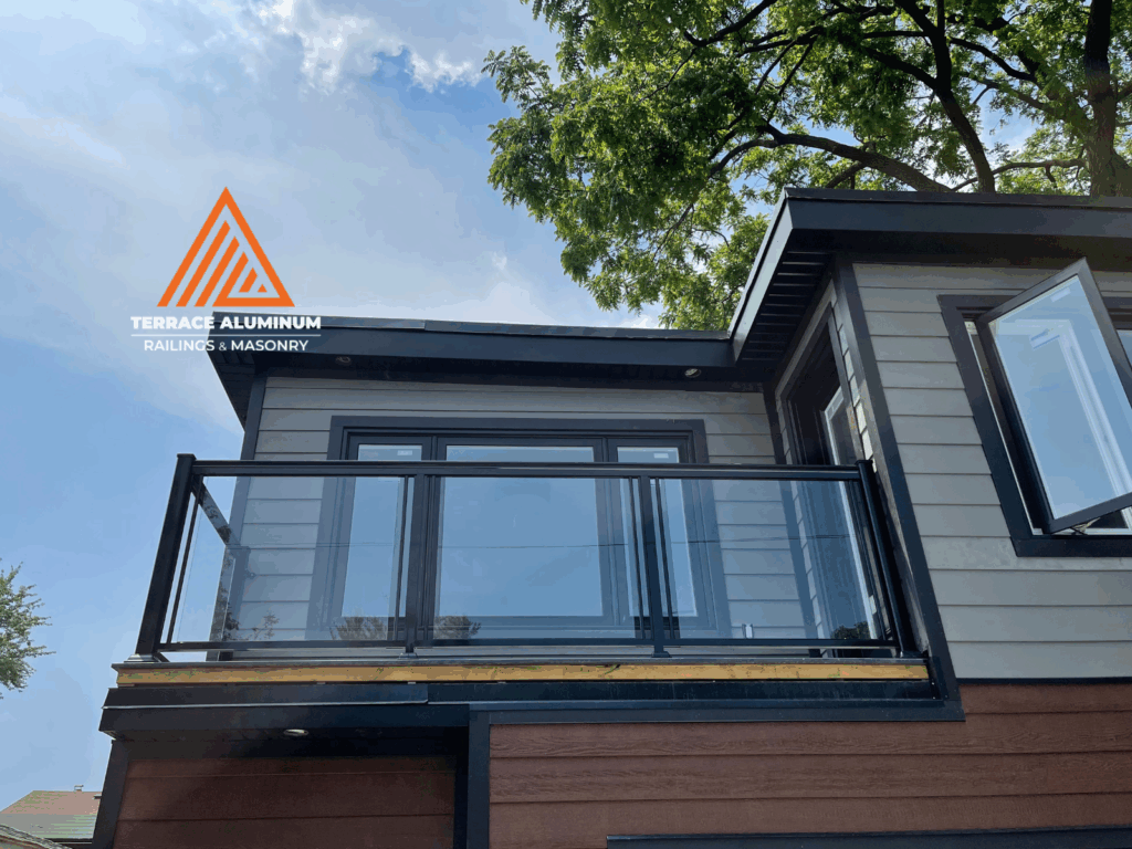 Aluminum framed glass balcony railing installation in Toronto home – Terrace Aluminum Railings & Masonry
