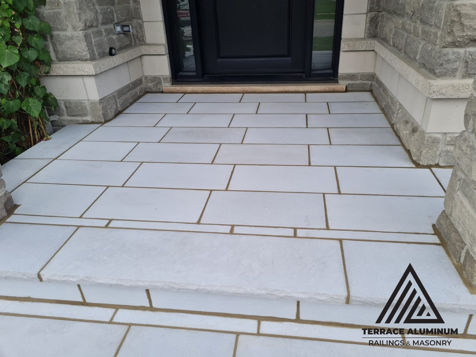 Front porch finished with flagstone and Indiana limestone steps in Toronto
