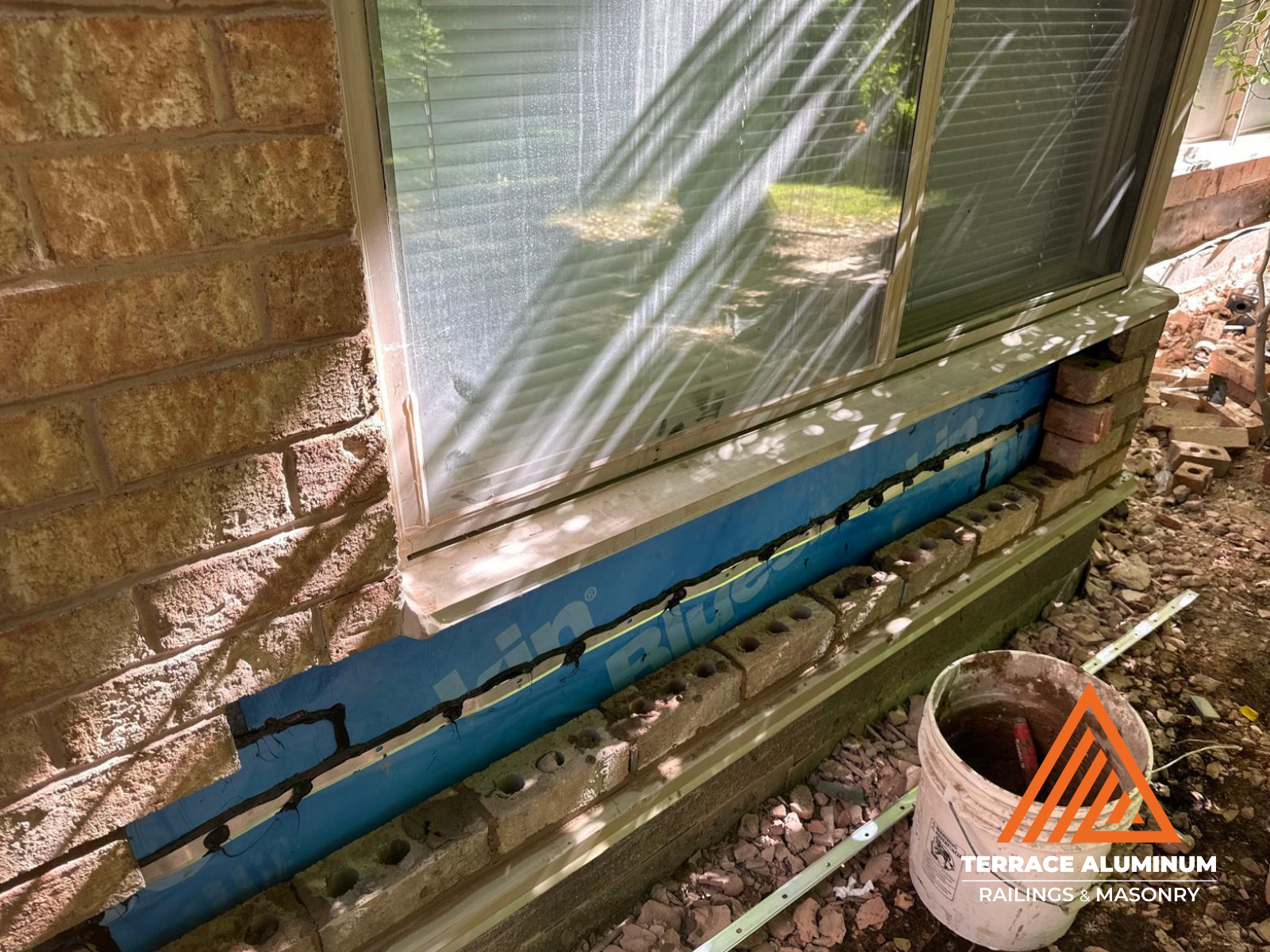 Brick repairs on exterior wall with new brick replacement in Toronto – Terrace Aluminum Railings & Masonry