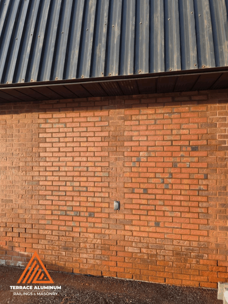 Brick wall repair and restoration on commercial building in Toronto – Terrace Aluminum Railings & Masonry