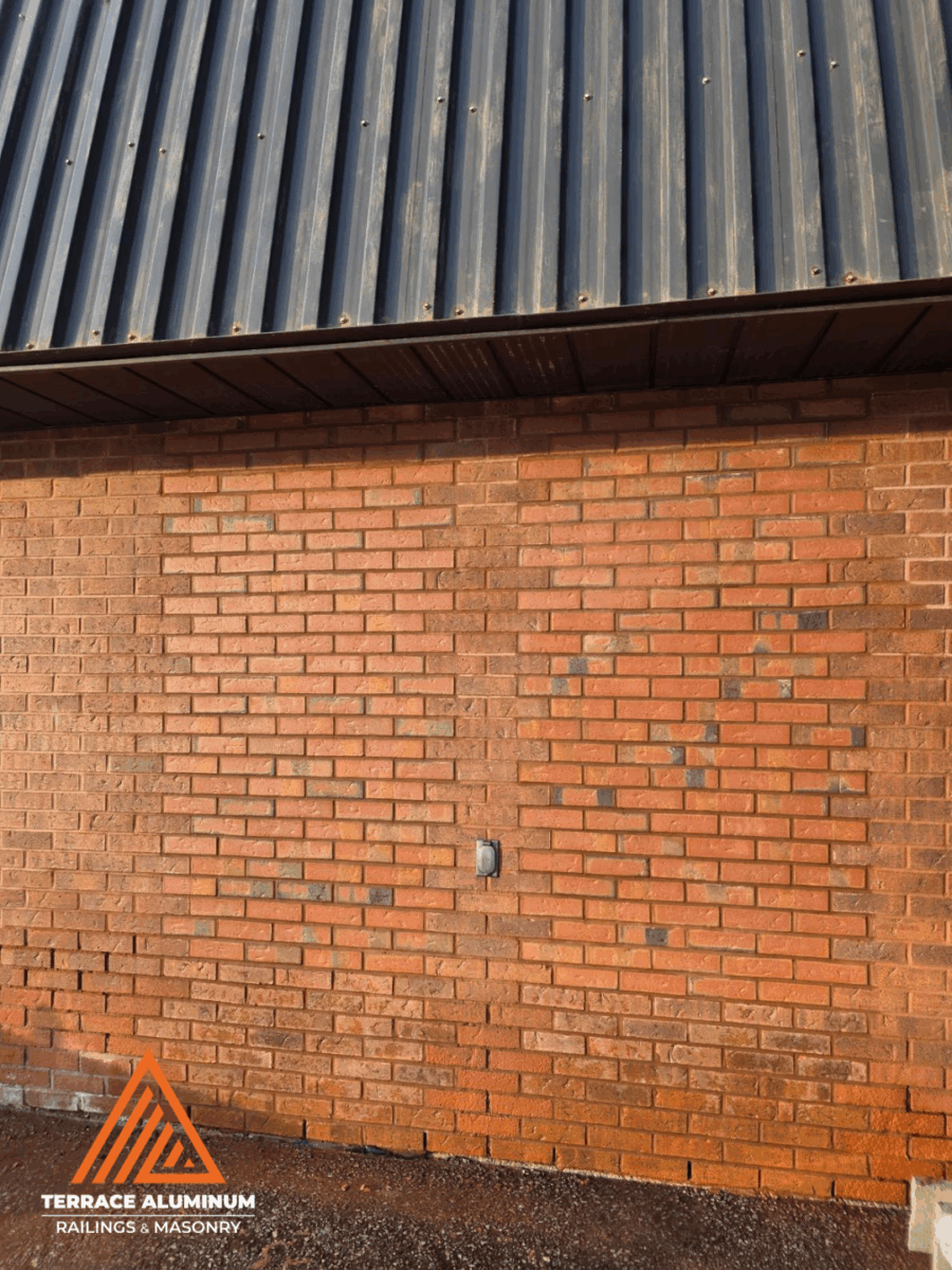 Brick wall repair and restoration on commercial building in Toronto – Terrace Aluminum Railings & Masonry