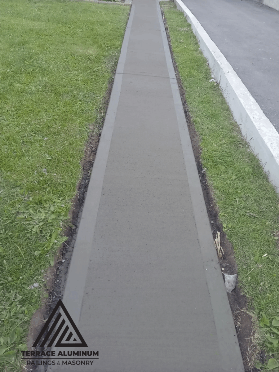 Concrete walkway repair in Toronto residential home – Terrace Aluminum Railings & Masonry