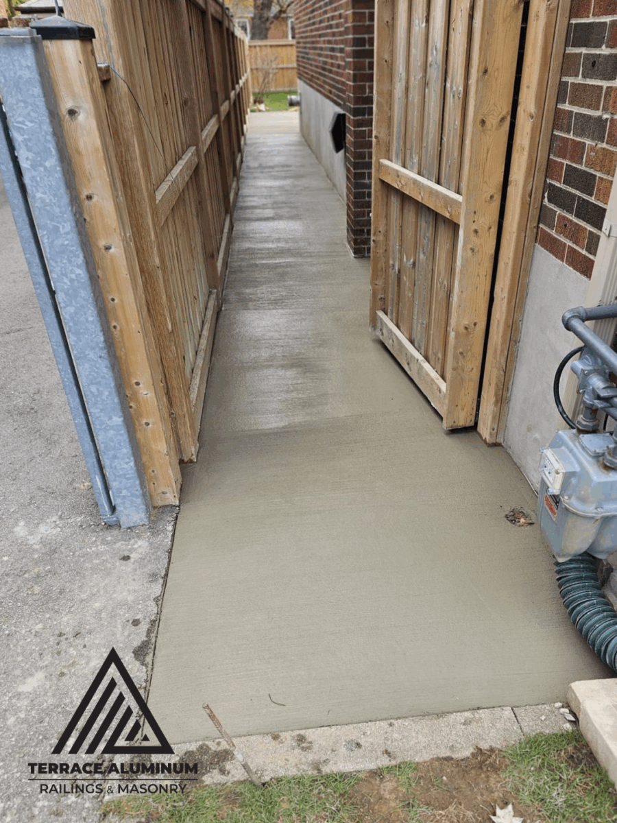 New concrete walkway installation in Toronto – Terrace Aluminum Railings & Masonry