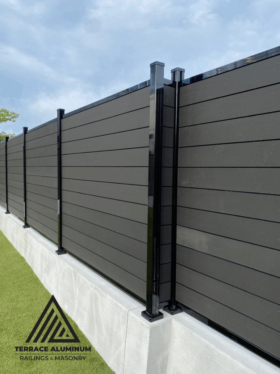 Modern composite fencing with horizontal slats and clean design