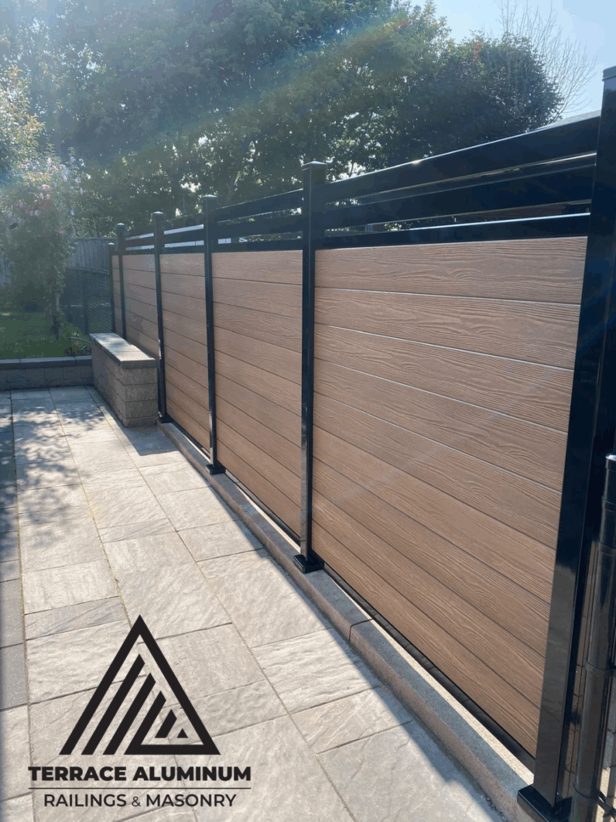 Backyard composite fence creating a private outdoor space