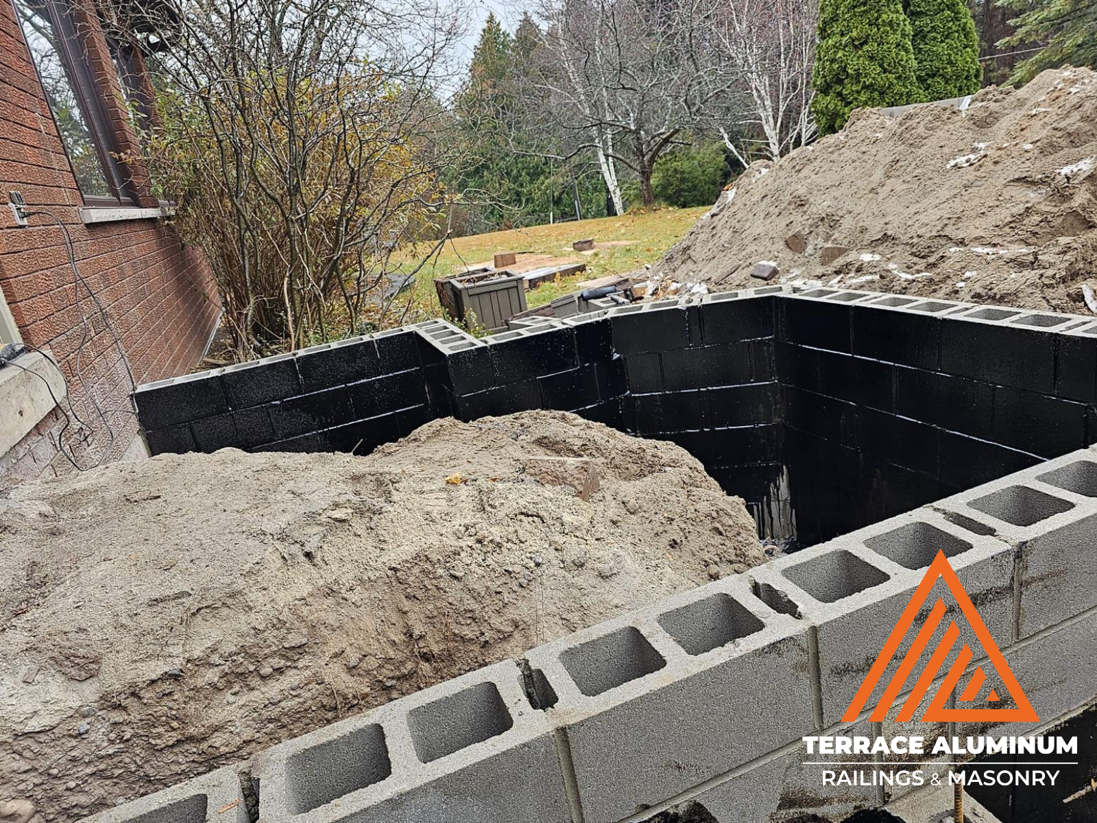 Concrete being poured and leveled during residential project in Toronto