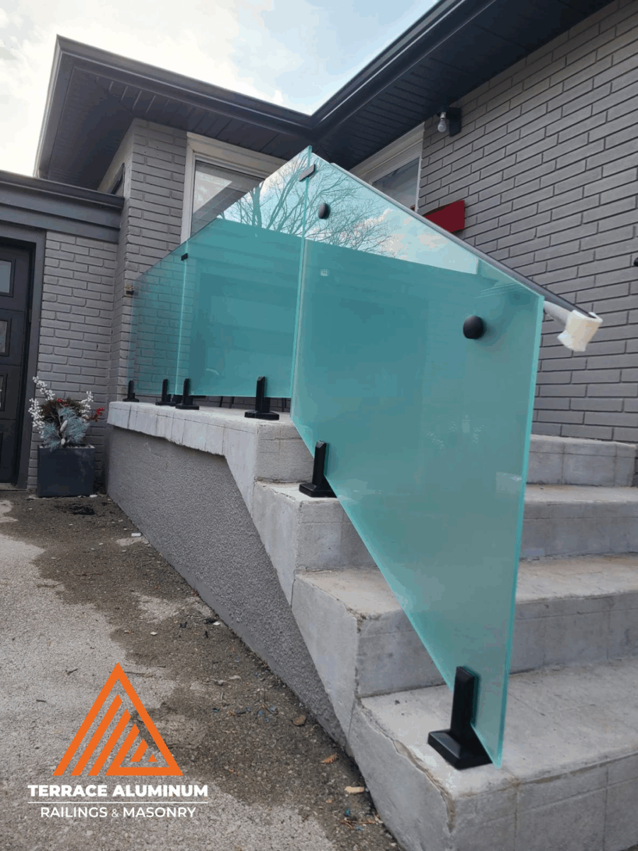 alt="Frosted frameless staircase glass handrail with 12mm tempered glass panels and stainless