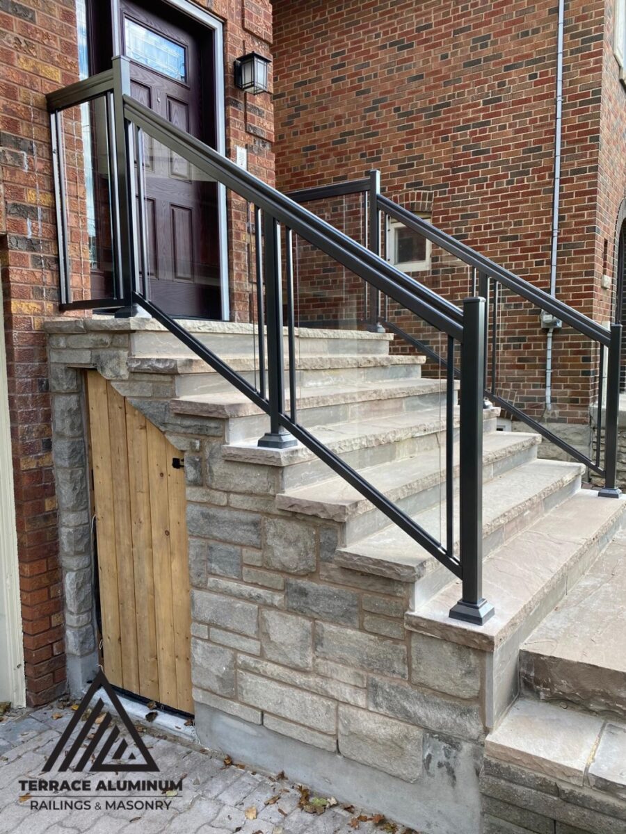 alt="Custom staircase glass handrail with tempered glass railing system in Toronto"