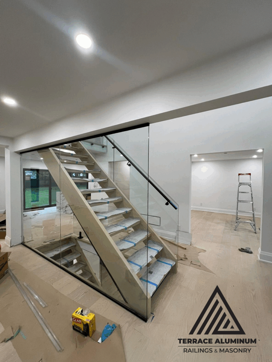 alt="Professional staircase glass handrail installation in Toronto home or business"