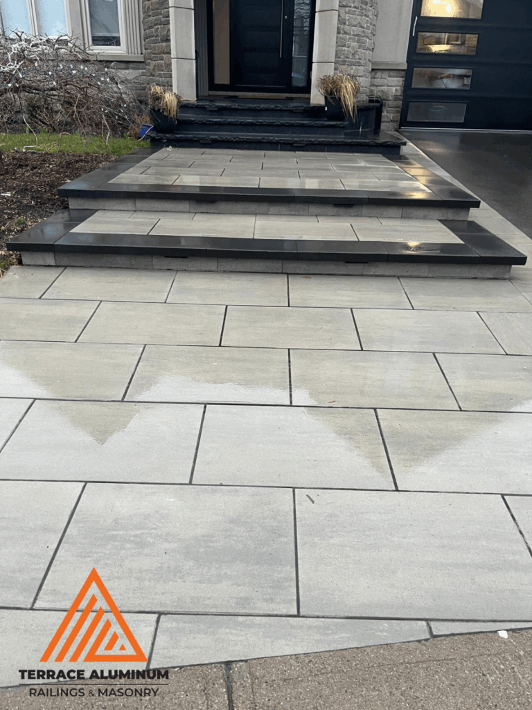 Interlock stone walkway and steps in Toronto by Terrace Aluminum Railings & Masonry.