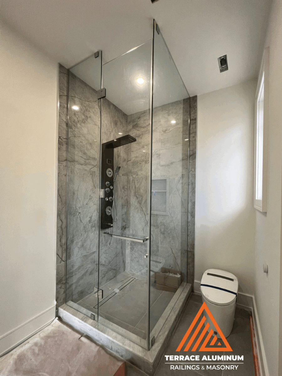 Custom shower glass panel fitted perfectly into bathroom space
