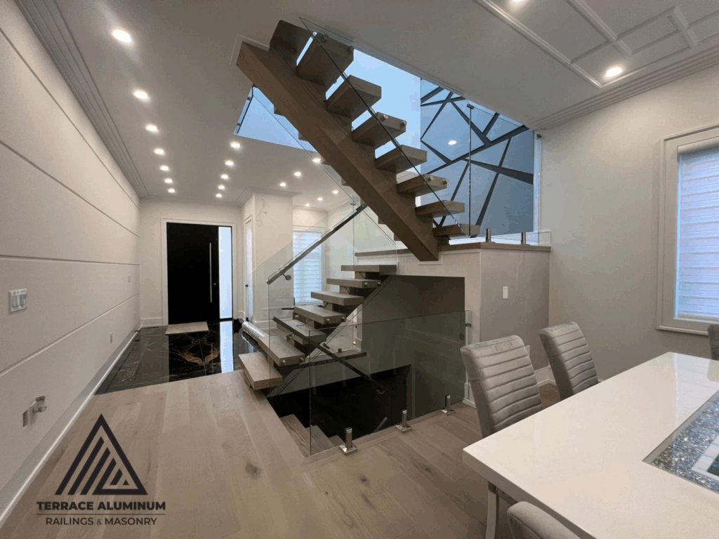 Interior glass railings Oakville — modern indoor glass railing installation by Terrace Aluminum Railings & Masonry