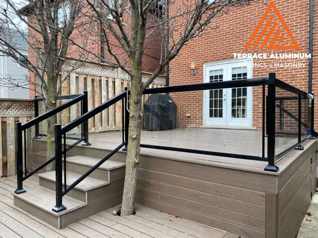 Aluminum and glass railing on rear deck in Oakville by Terrace Aluminum Railings & Masonry