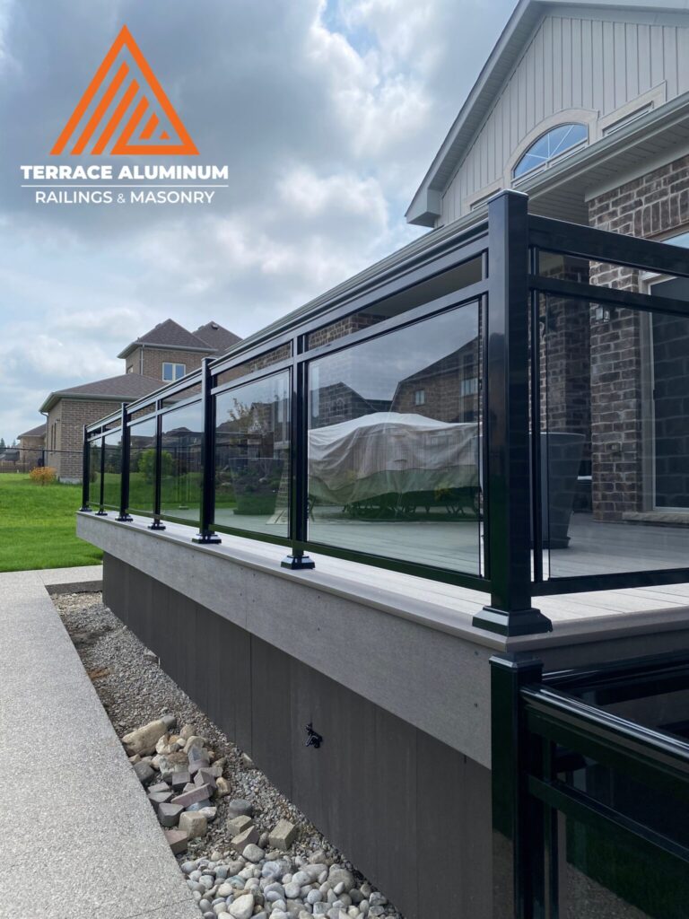 Aluminum and glass railing on rear deck in Oakville by Terrace Aluminum Railings & Masonry