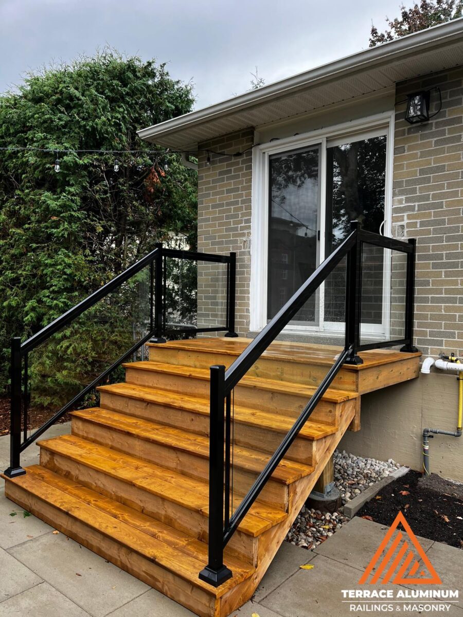 Minimalist glass railing installed on a balcony, highlighting unobstructed views and sleek design.