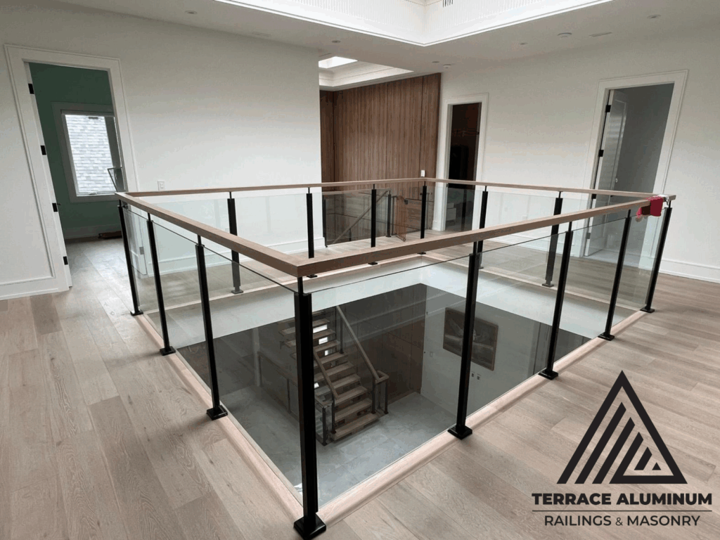 nterior semi-frameless glass railing Oakville — modern indoor glass railing by Terrace Aluminum Railings & Masonry