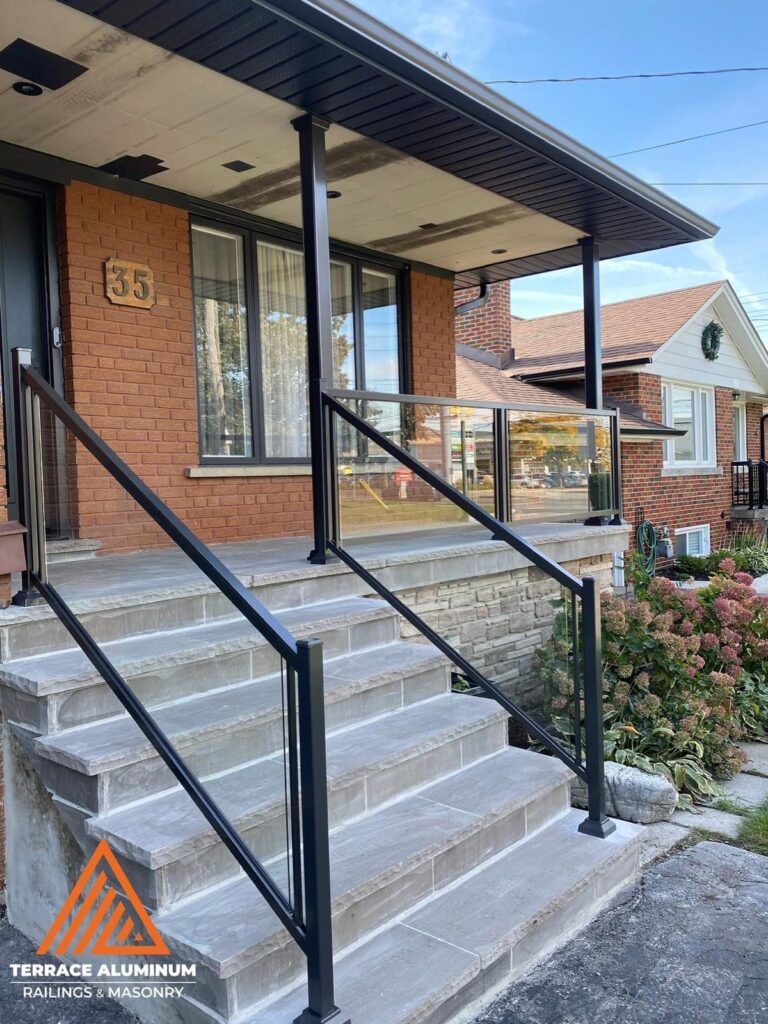 Front porch with extensive railing showing how railings frame the home’s entrance