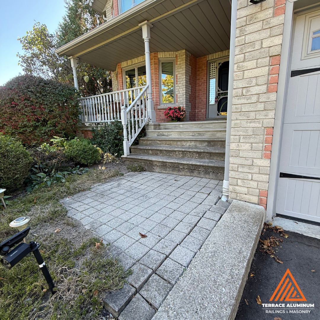 Flagstone porch leading to front entrance