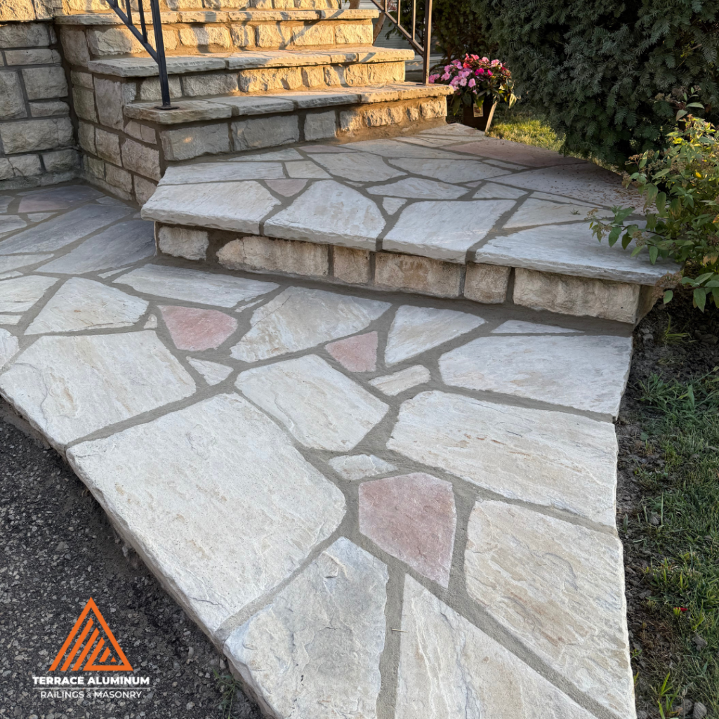 Flagstone repair Hamilton with new tuckpointing on old stone surface