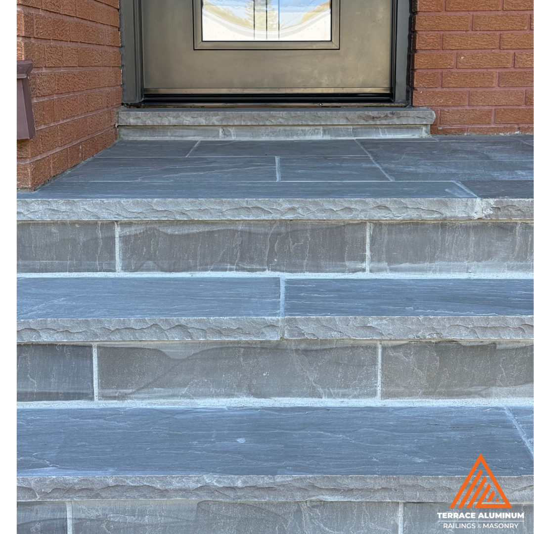 Flagstone porch and steps repair with solid joint restoration