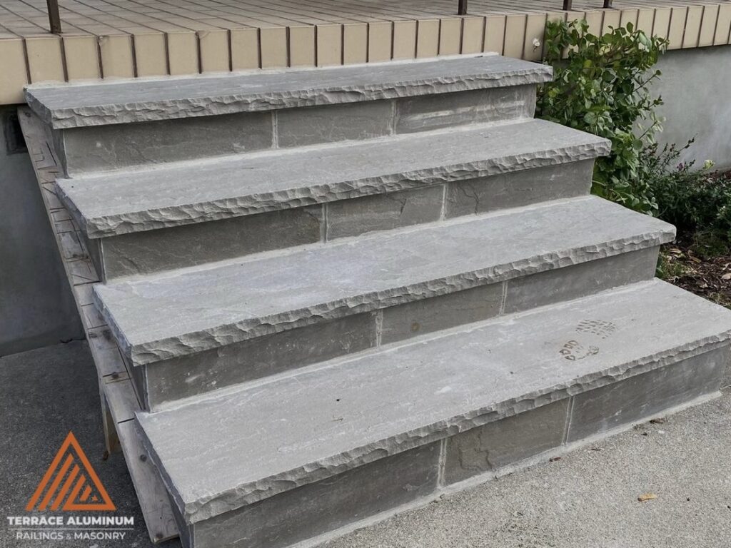 Flagstone steps installed as part of a Hardscaping Oakville project