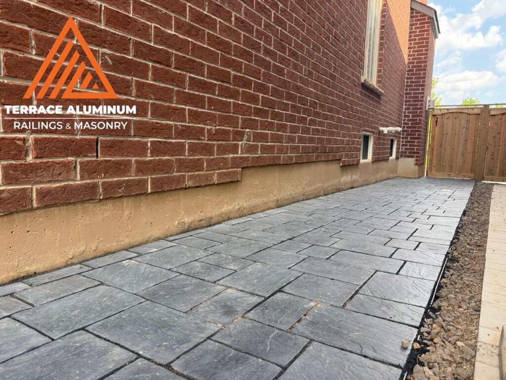 Interlocking paver walkway installed as part of a Hardscaping Oakville project