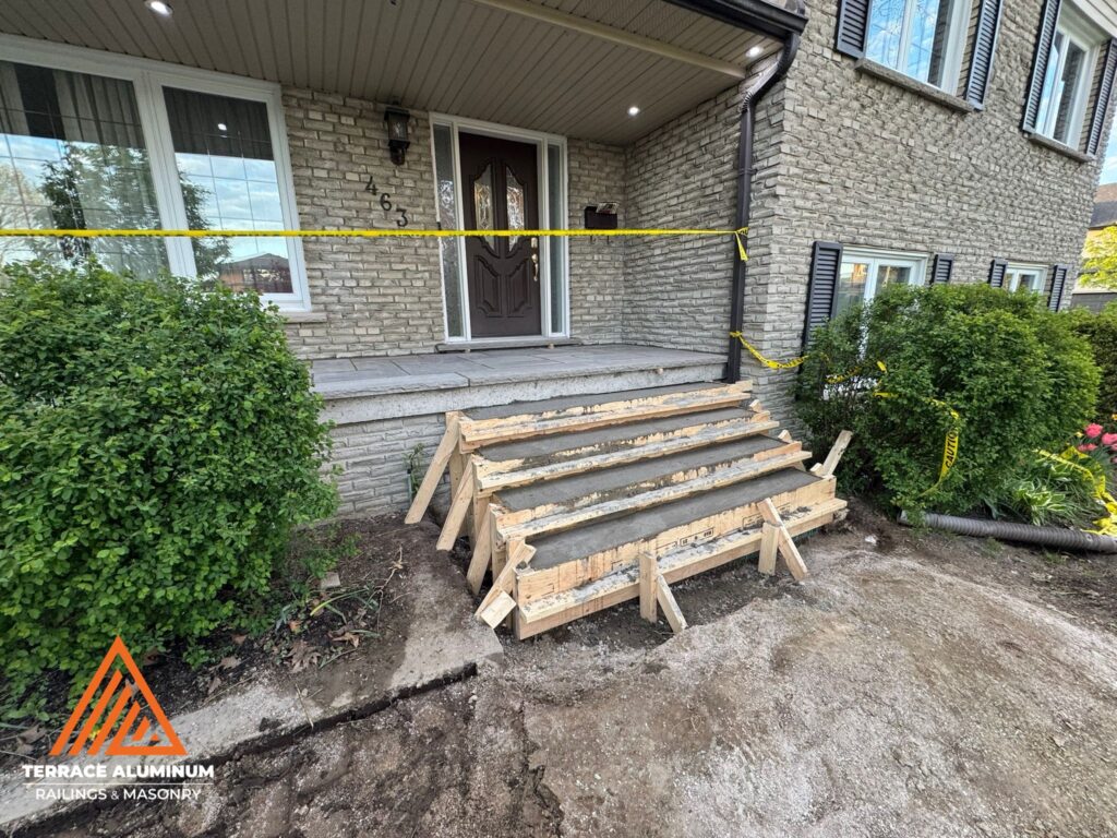 New concrete staircase built as part of a hardscaping services project in Etobicoke.