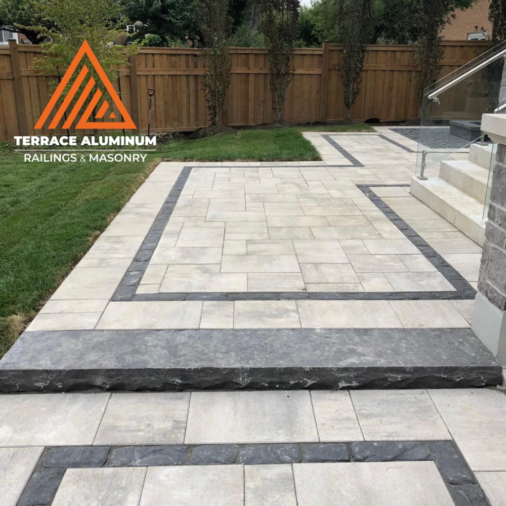 Large interlock patio installed as part of a hardscaping services project in Etobicoke.