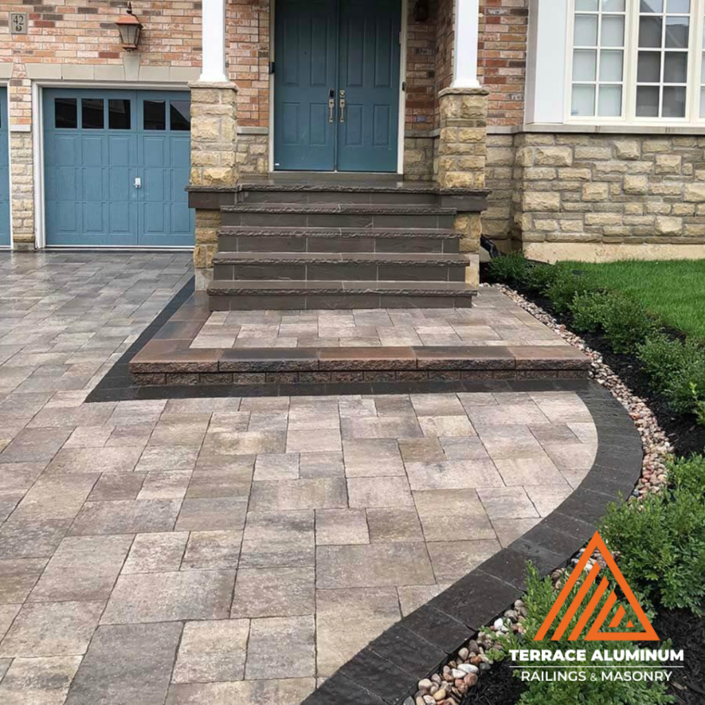 Interlock front porch landing installed as part of a Hardscaping Oakville project
